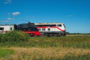 218 497 - 2025-08-18-100 Emmelsbüll Lehnshallig 218 497 zieht den IC 2215 nach Köln, in Itzehoe wird eine 101 den Zug übernehmen.