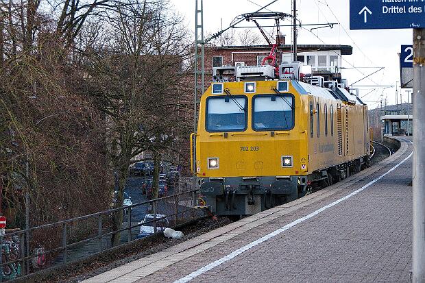 702 203